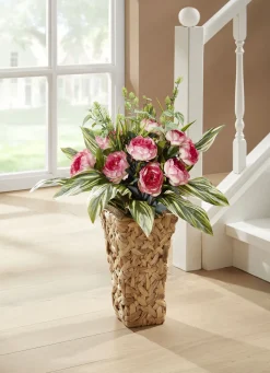 Bauernrosen in Wasserhyazinthen-Korb