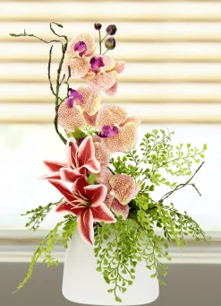 Bezauberndes Orchideen-Gesteck in Vase