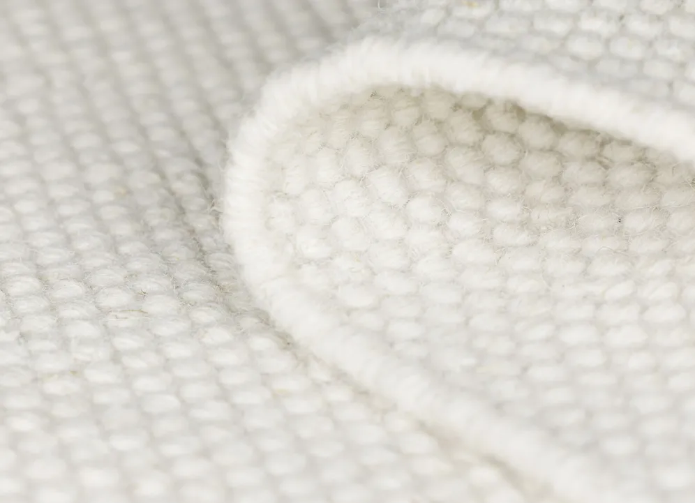 Brücken und Teppiche aus feuchtigkeitsregulierender Naturfaser