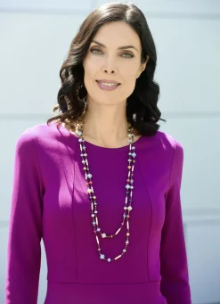 Kleid mit aufspringenden Kellerfalten