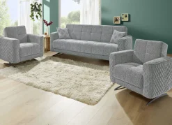 Polstermöbel mit Bettfunktion und Dekokissen