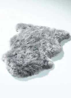 Vorleger aus echtem Lammfell in Tierform