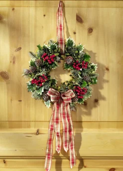 Wandkranz mit Tannen- und Ilex-Zweigen