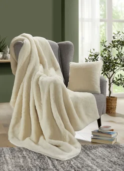 Webpelzdecke und Kissenbezug aus Alpakawolle