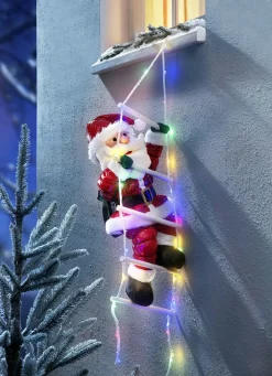 Weihnachtsmann auf LED-Leiter