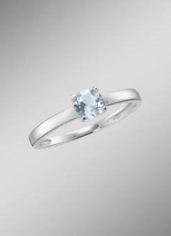 Zeitlose Eleganz: Damenring mit beh. Blautopas